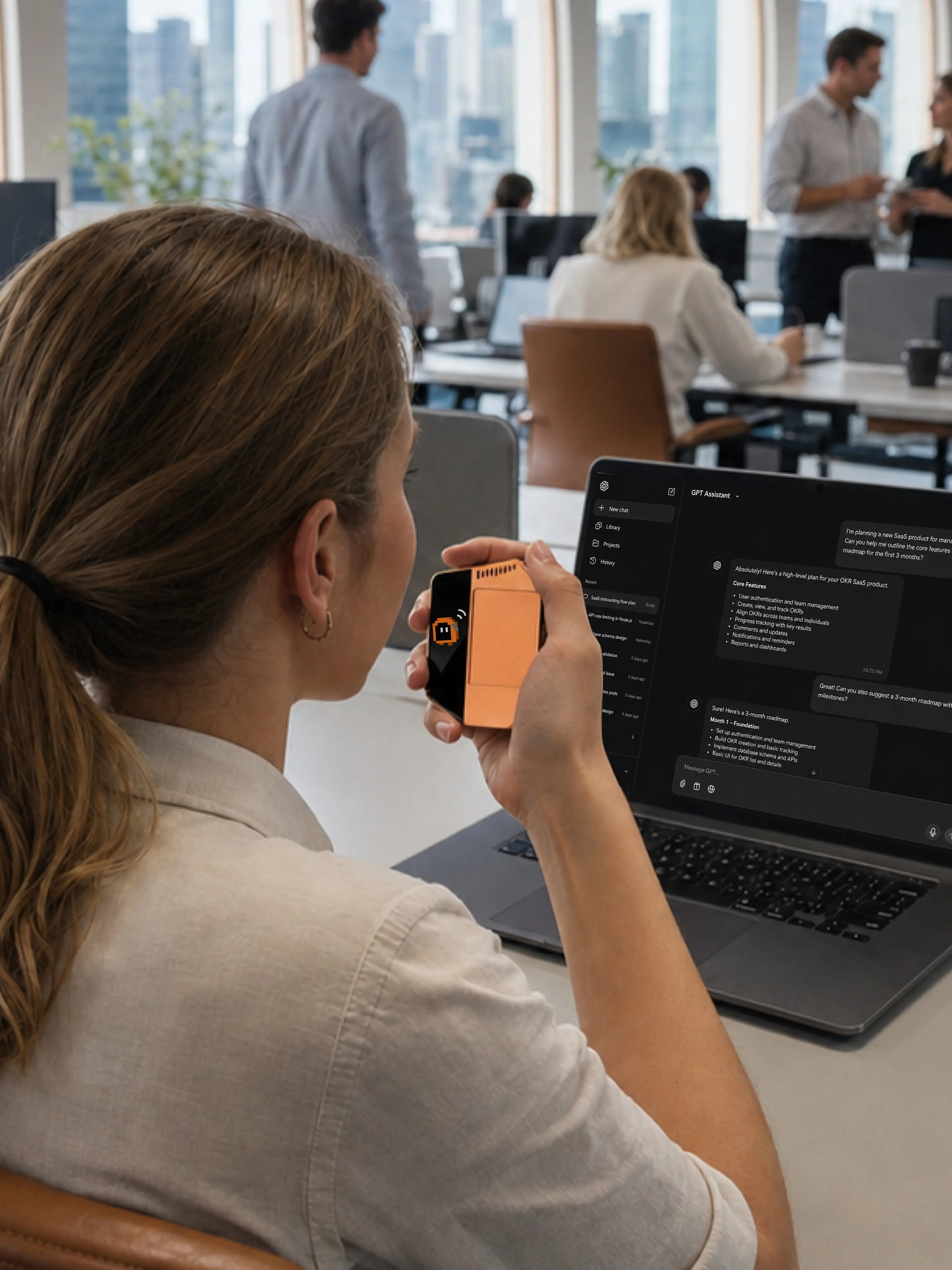 A person quietly briefing an AI assistant with WhisPrompt in a shared office